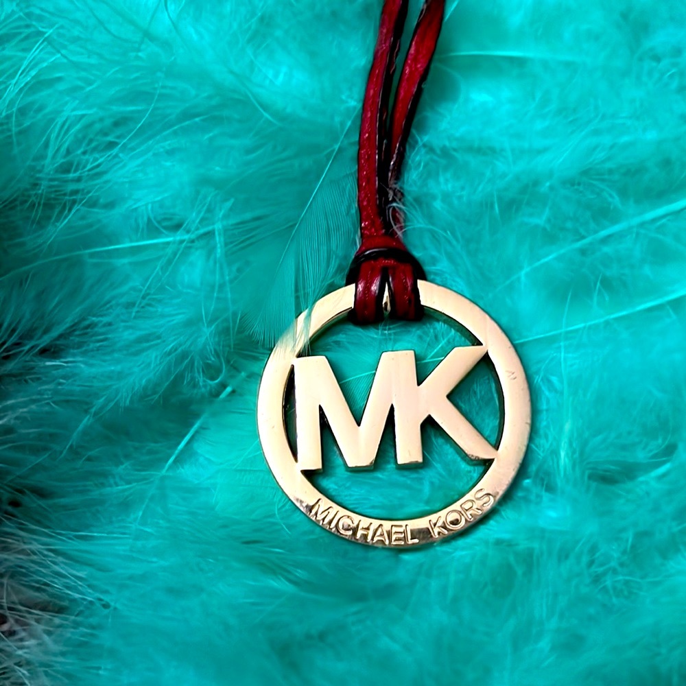 MK tassel